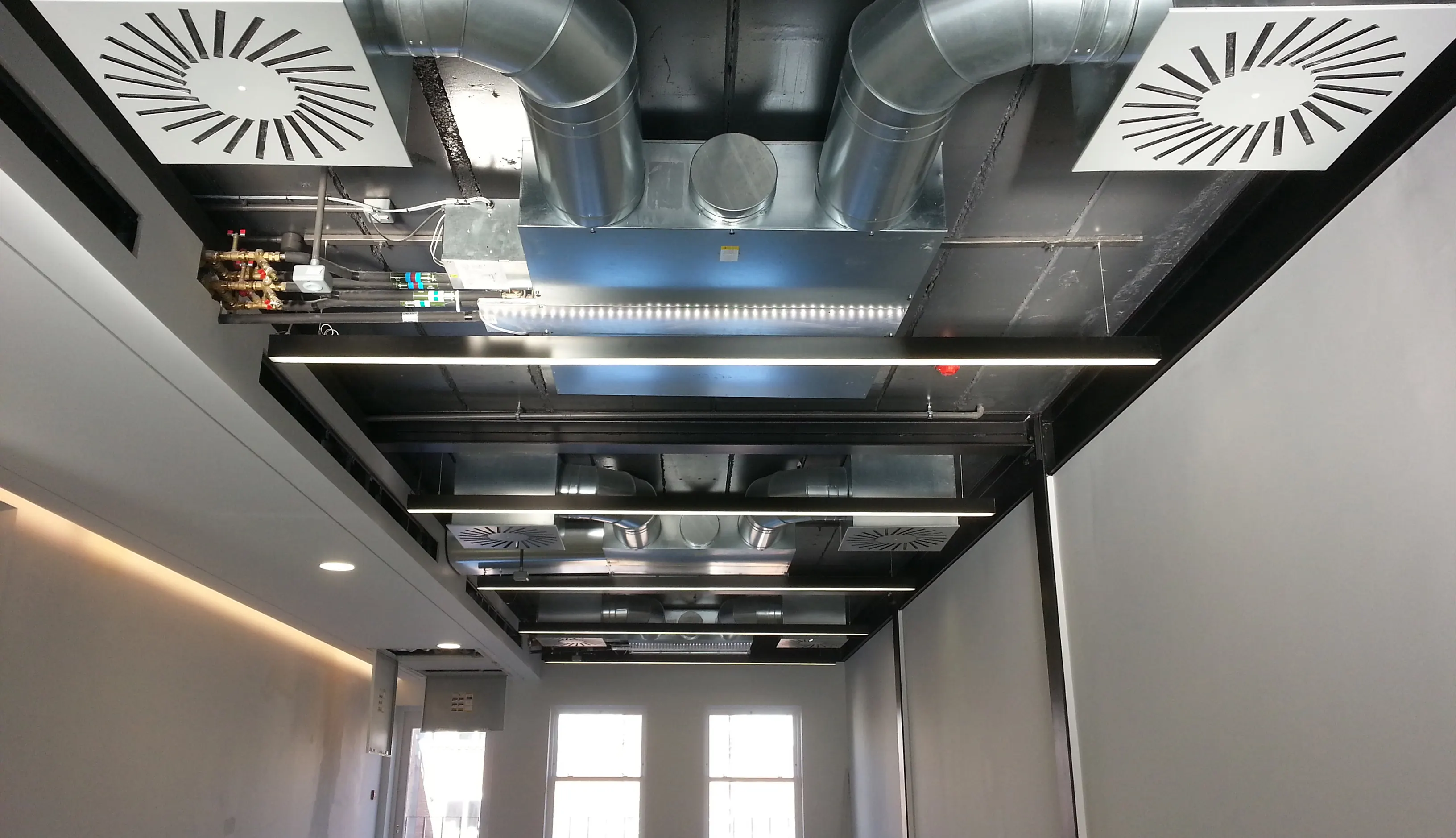 Ducted Air Conditioning With Ventilation and Heat Recovery installed for office units by Masper HVAC Engineers