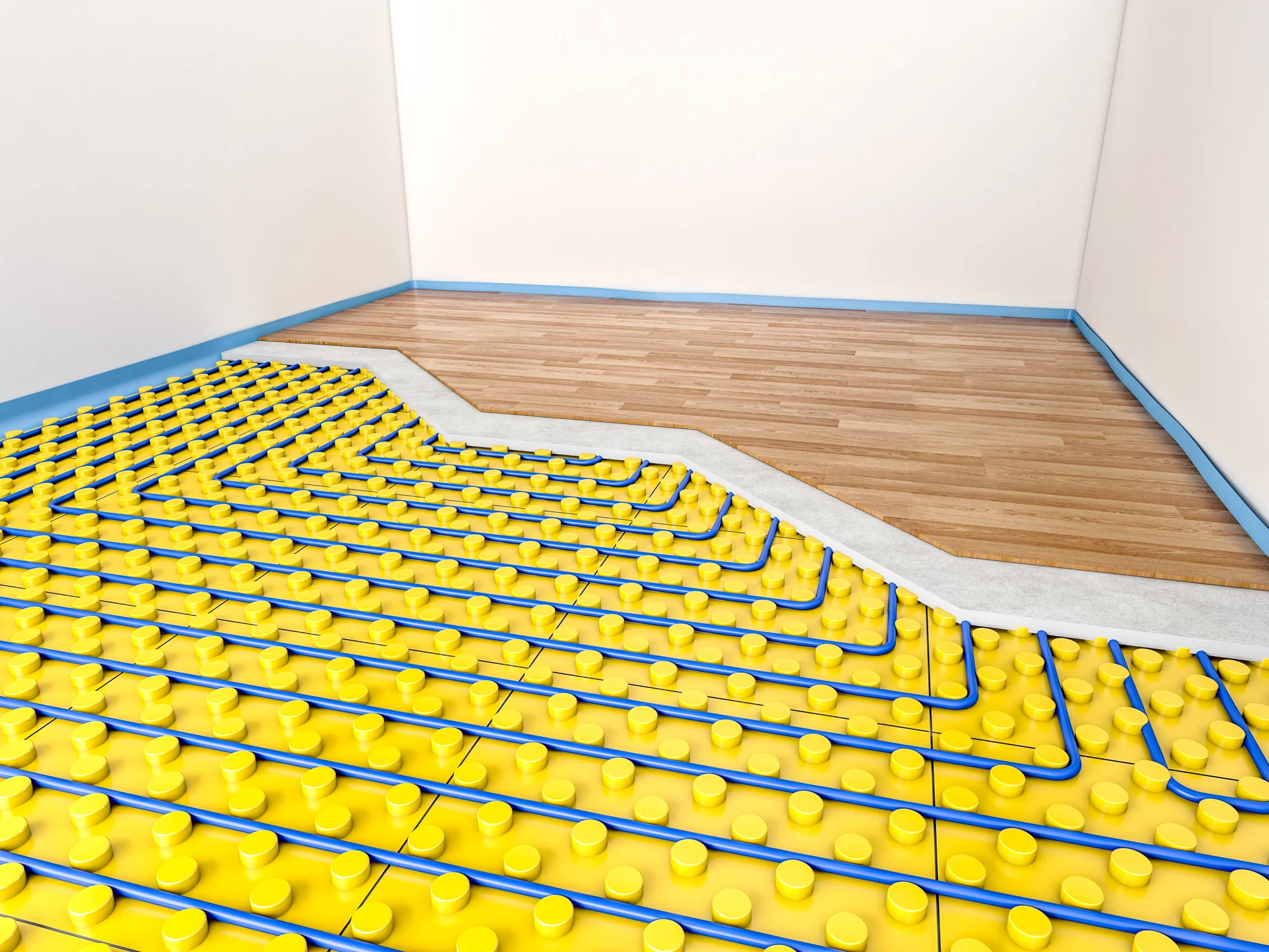 image with a new underfloor heating wet system showing also the ufh matt with pipe coils laid down and floor insulation with wood floor on top and insulation all around the edges